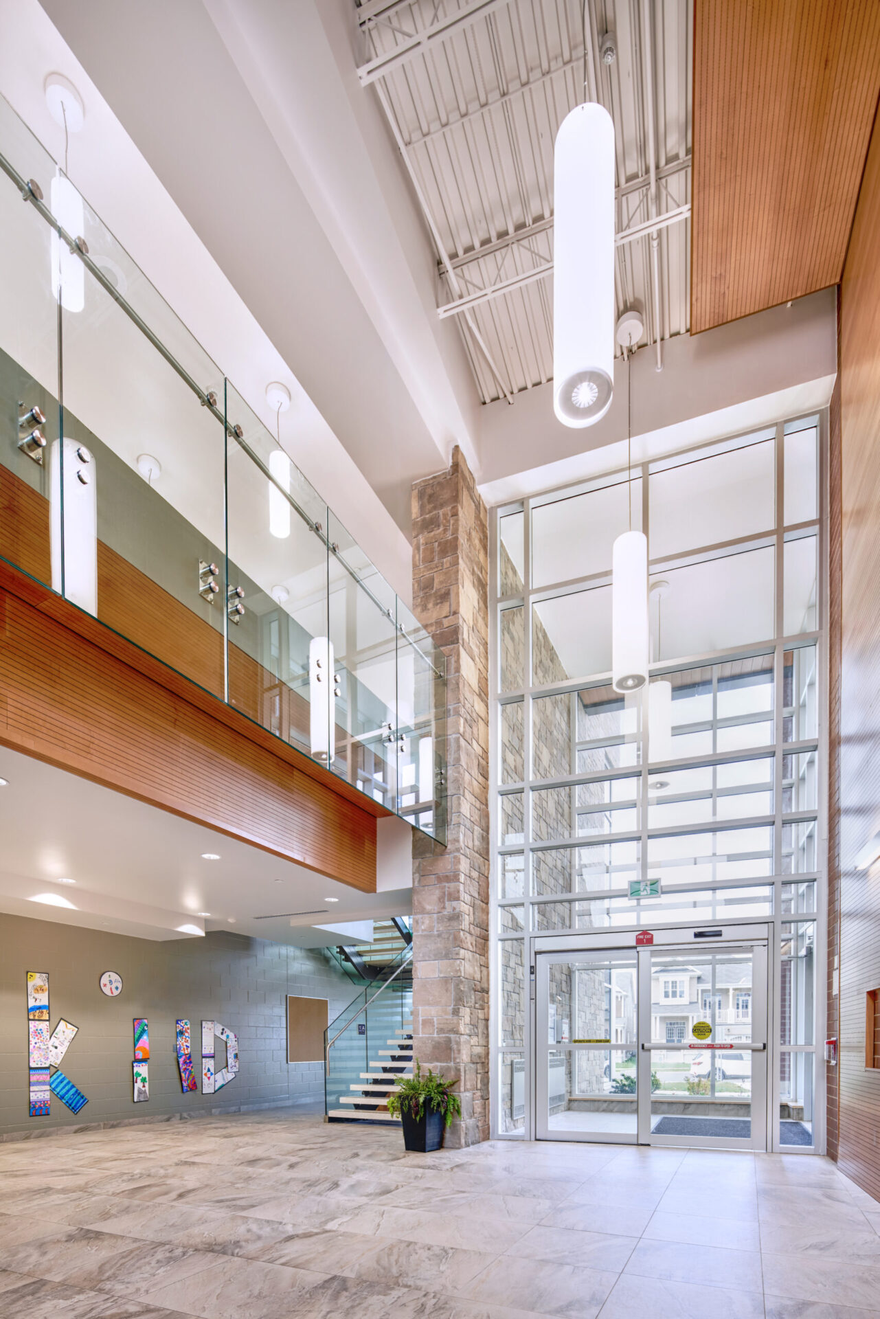 A spacious lobby showcasing mesmerizing engineering and an awe-inspiring glass ceiling.