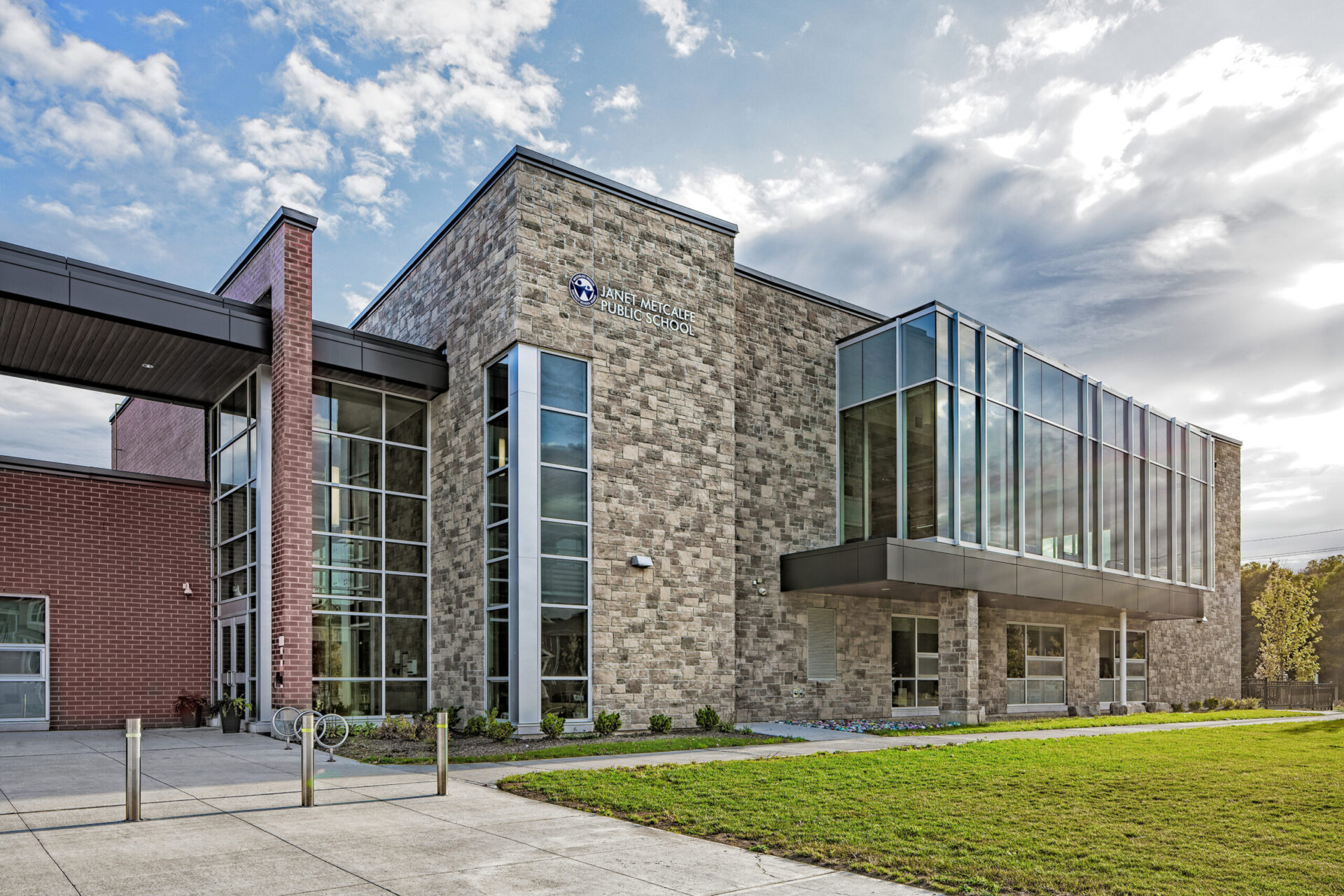 The architectural design of a building with glass windows.