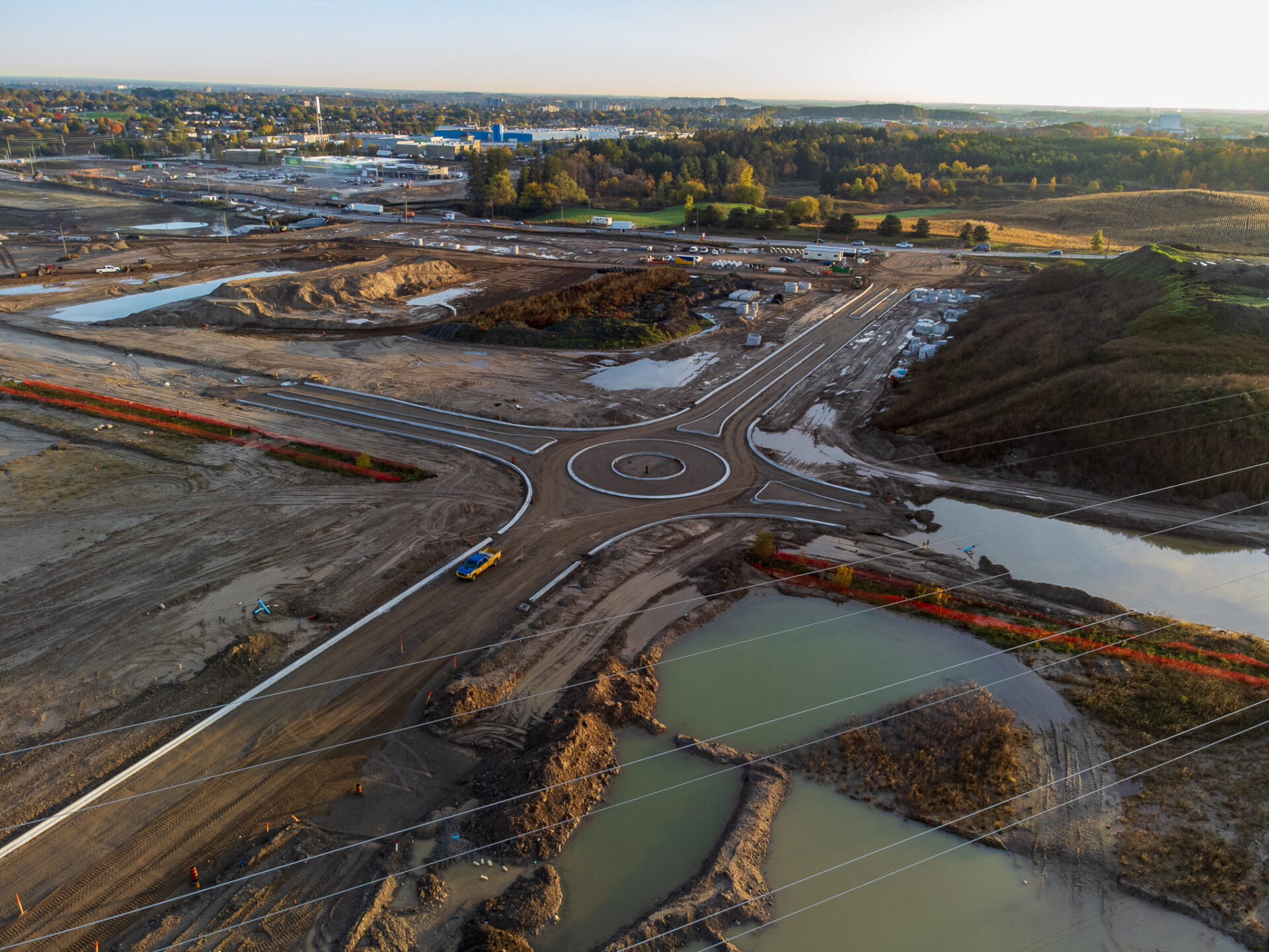 Aerial image of the subdivision highlighting the dutch roundabout and various stormwater facilities.